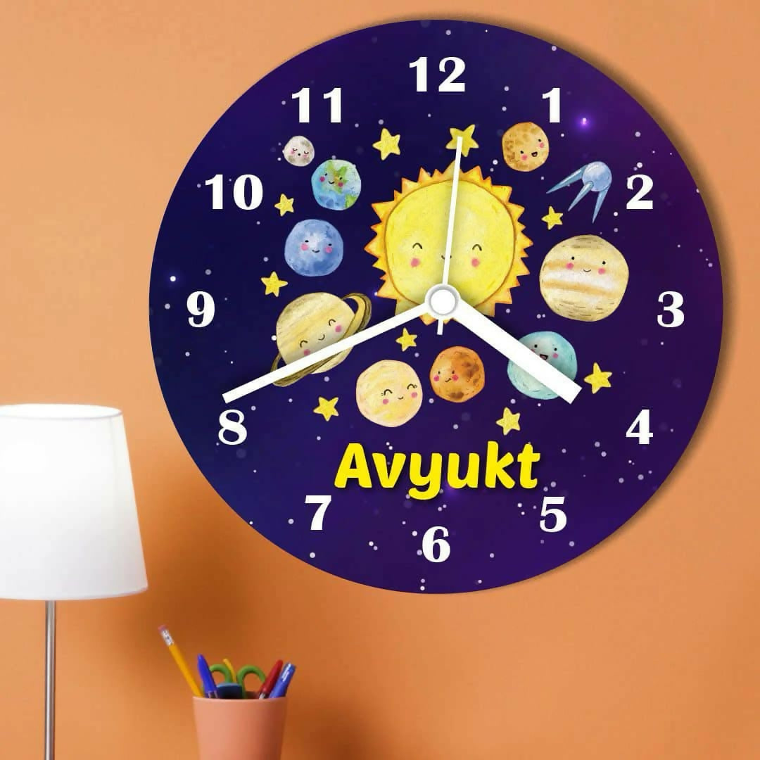 Children's wall clock with solar system design 