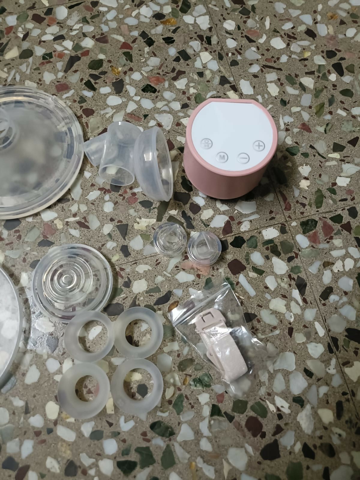 Lifelong Cuppy wearable breast pump with hands-free design, adjustable suction levels, lightweight collection cups, and rechargeable operation for comfortable and discreet milk expression.