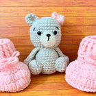Crochet baby booties and bear set.