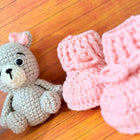 Crochet baby booties and bear set.