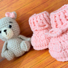 Crochet baby booties and bear set.