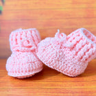 Crochet baby booties and bear set.