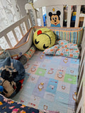 Wooden baby crib with storage, mattress, and bumper featuring sturdy wooden construction, spacious sleeping area, built-in storage, protective bumpers, and comfortable support for babies.