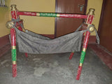 Wooden Cradle with Cloth Stand featuring a sturdy wooden frame, soft cloth hammock, gentle rocking motion, breathable design, and stable construction for a safe and comfortable sleeping space for newborns.
