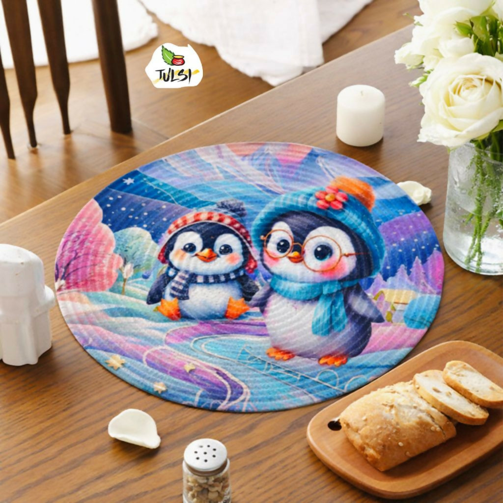 Round placemat with penguin design 