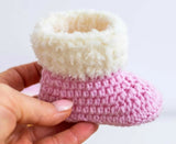 Handmade baby booties and beanie set, customizable with premium yarn for warmth, comfort, and a personal touch.