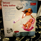 Discover the DELUXE Baby Bather, offering a secure mesh sling, ergonomic design, and easy storage for safe and comfortable baby baths.