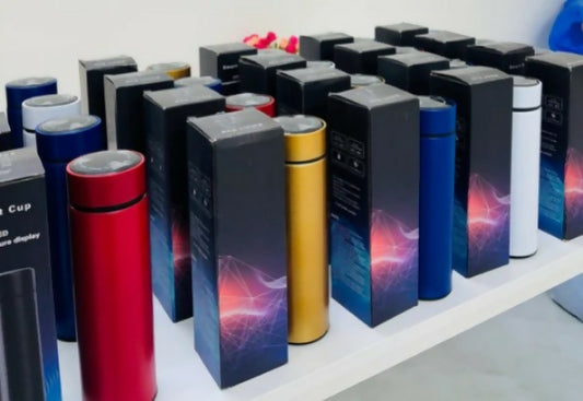 Collection of colorful thermos bottles 