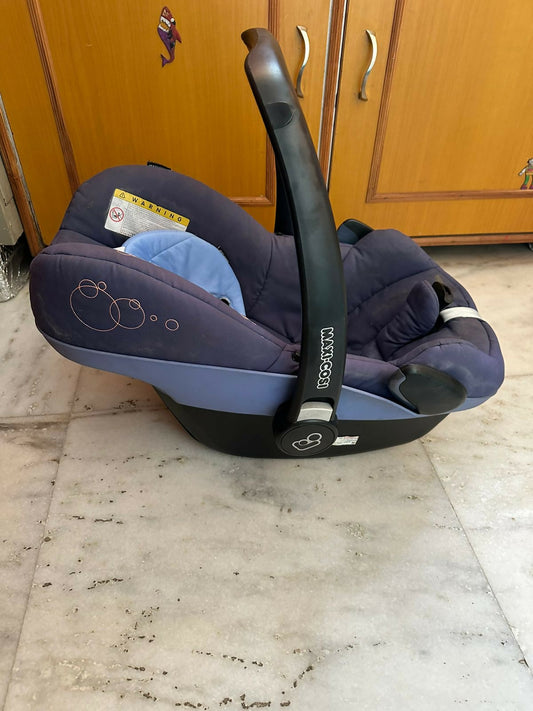 MAXICOSI car seat for babies with advanced safety features, adjustable harness, and plush padding for ultimate comfort and security.