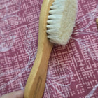 Imported wooden comb and brush set with rubber bands—gentle, eco-friendly, and perfect for baby hair care and styling.