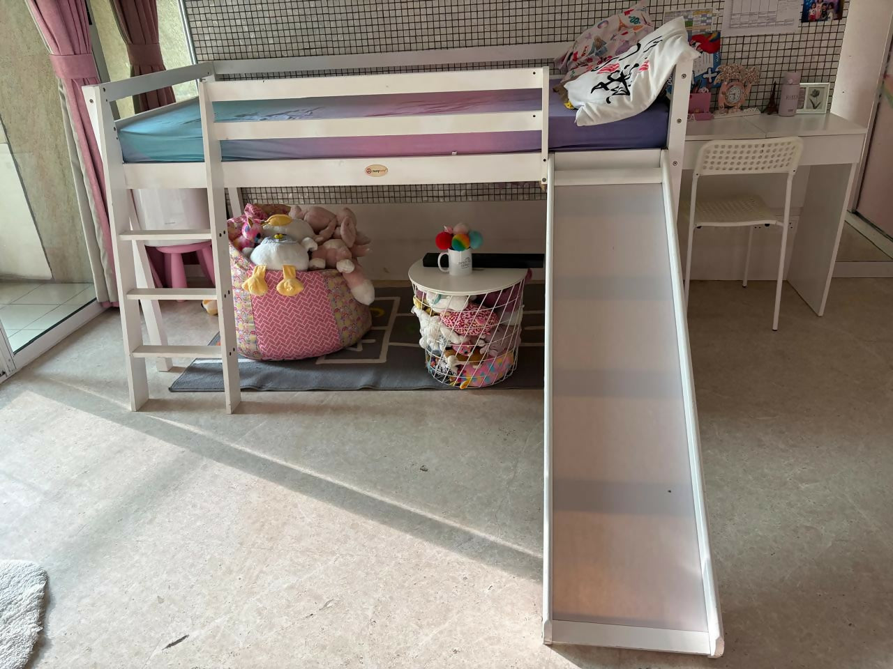 Children's bed with slide and toys 