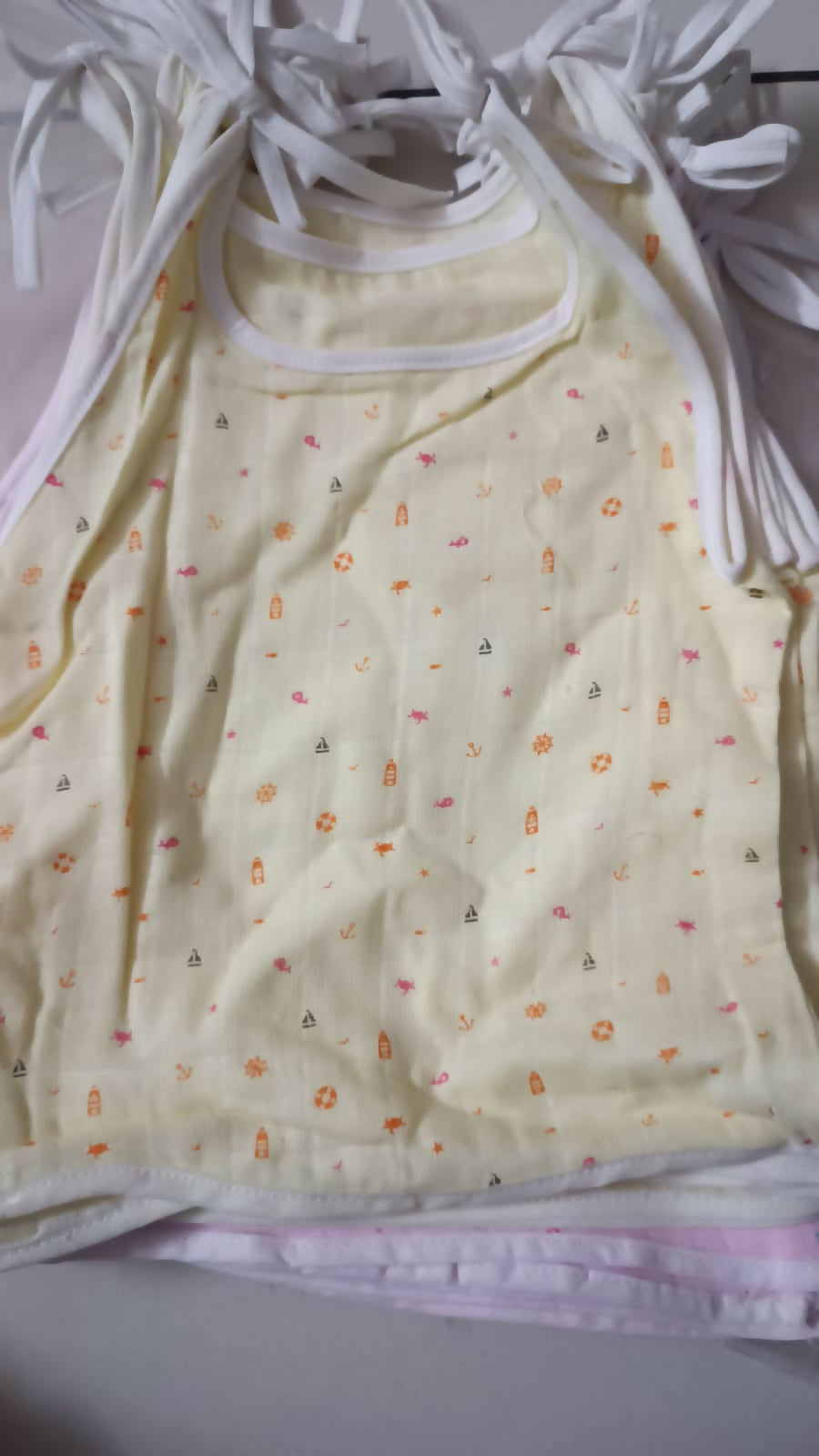 Soft and breathable Muslin Dori Zabla, made from 100% muslin cotton with adjustable ties for a comfortable and secure fit for your baby.