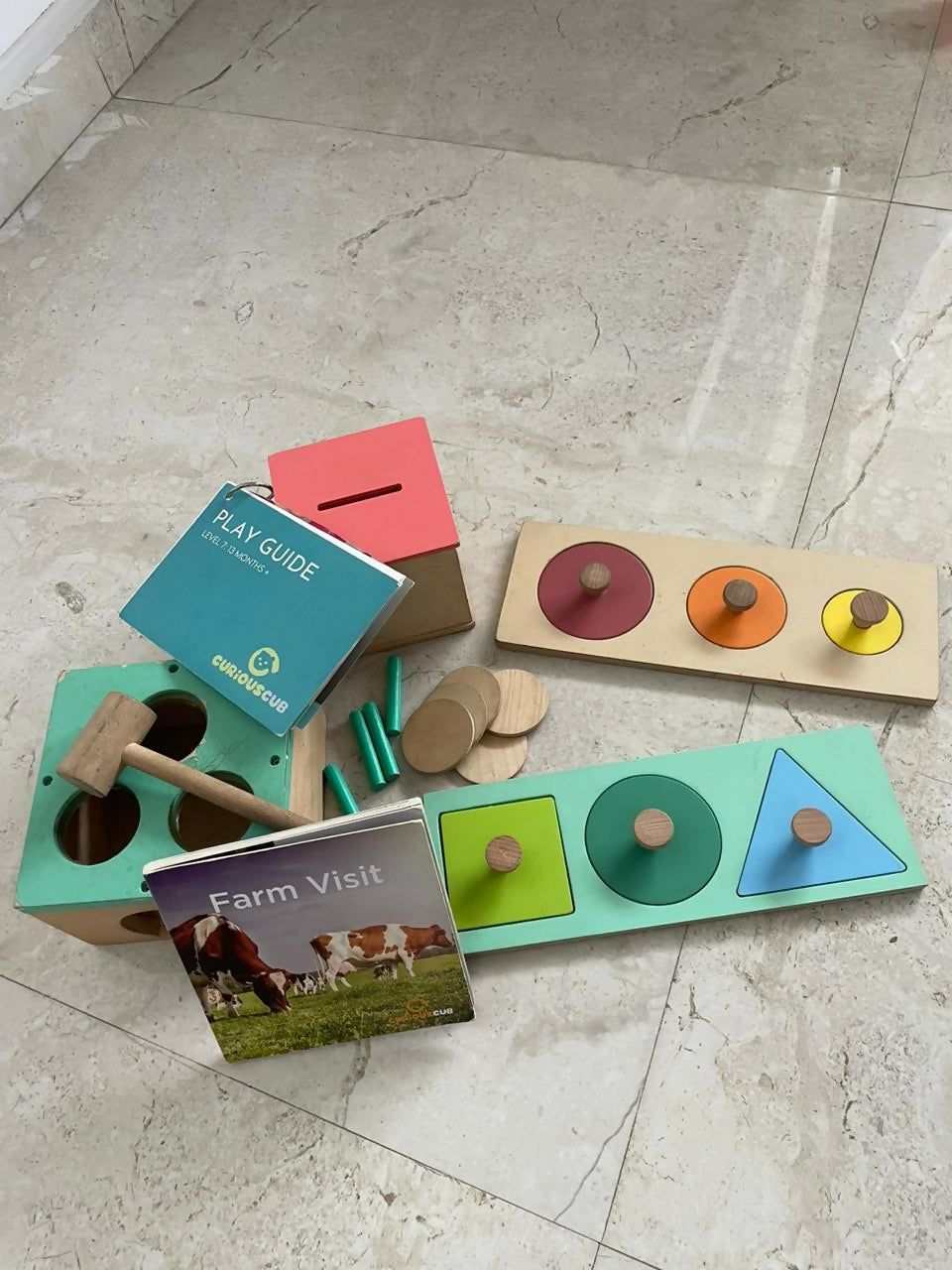 Montessori-inspired activity box for toddlers, boosting cognitive skills, fine motor development, and creative exploration.