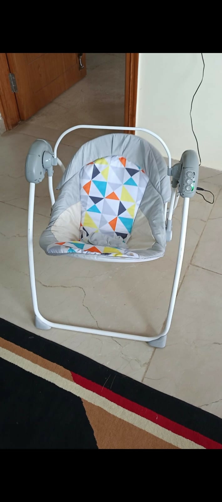 Automatic Swing with Multiple Speeds, Soothing Melodies, and Comfortable Seating for Babies.