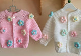  Baby sweater, headband, booties, cap, and mittens set – a cozy and stylish outfit to keep your little one warm and comfortable.