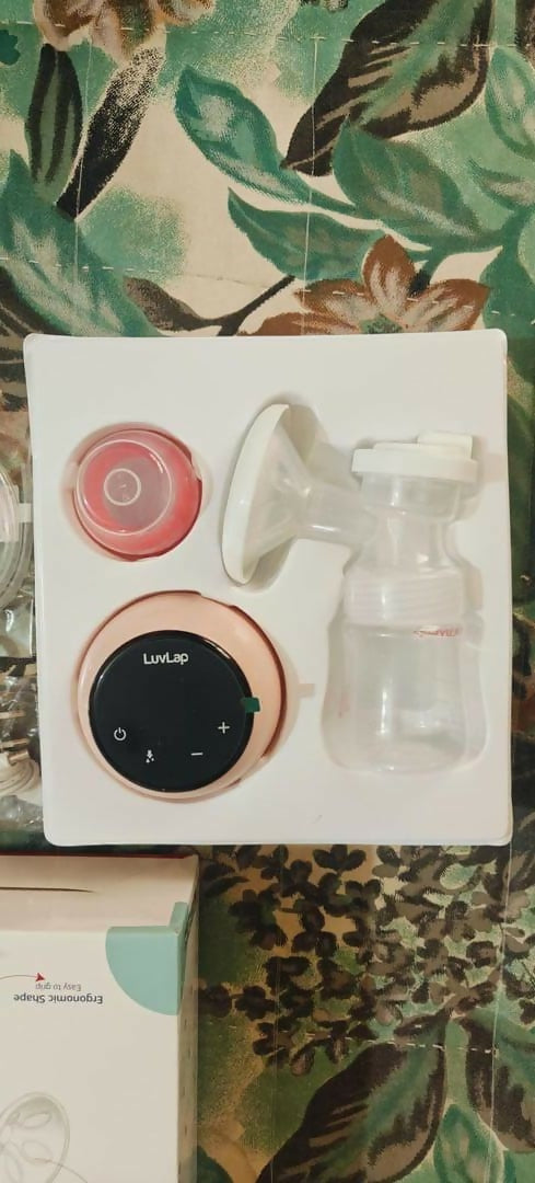 Enhance your breastfeeding experience with the LUVLAP Adore Single Electric Breast Pump – offering adjustable suction levels, a soft silicone massage cushion, and a compact design for comfortable and efficient milk expression.