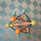 Curious cub geometric rattle ball toy