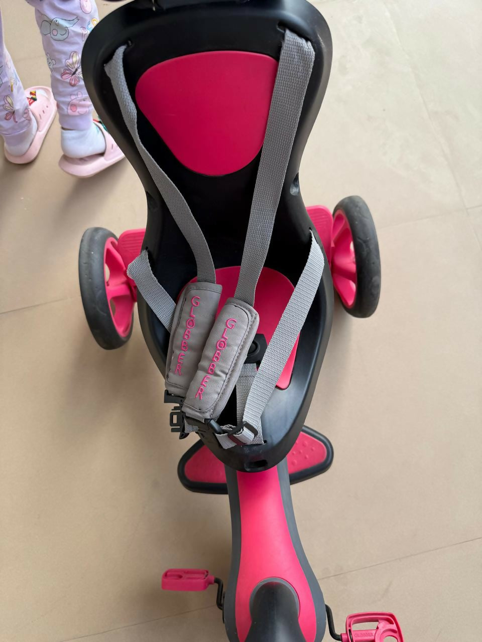 Baby tricycle with a sturdy frame, smooth wheels, ergonomic seat, and parent steering handle—perfect for safe and fun toddler adventures indoors and outdoors.