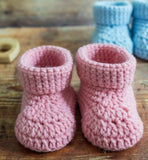 Soft and comfortable booties set for babies, perfect for warmth and style, made with baby-safe materials for everyday wear.