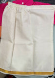 White skirt with gold trim on a pink fabric background