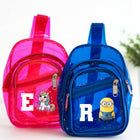 Pink and blue transparent bags with cartoon characters on a white background