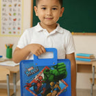 Child holding a blue Marvel Heroes lunchbox in a classroom setting