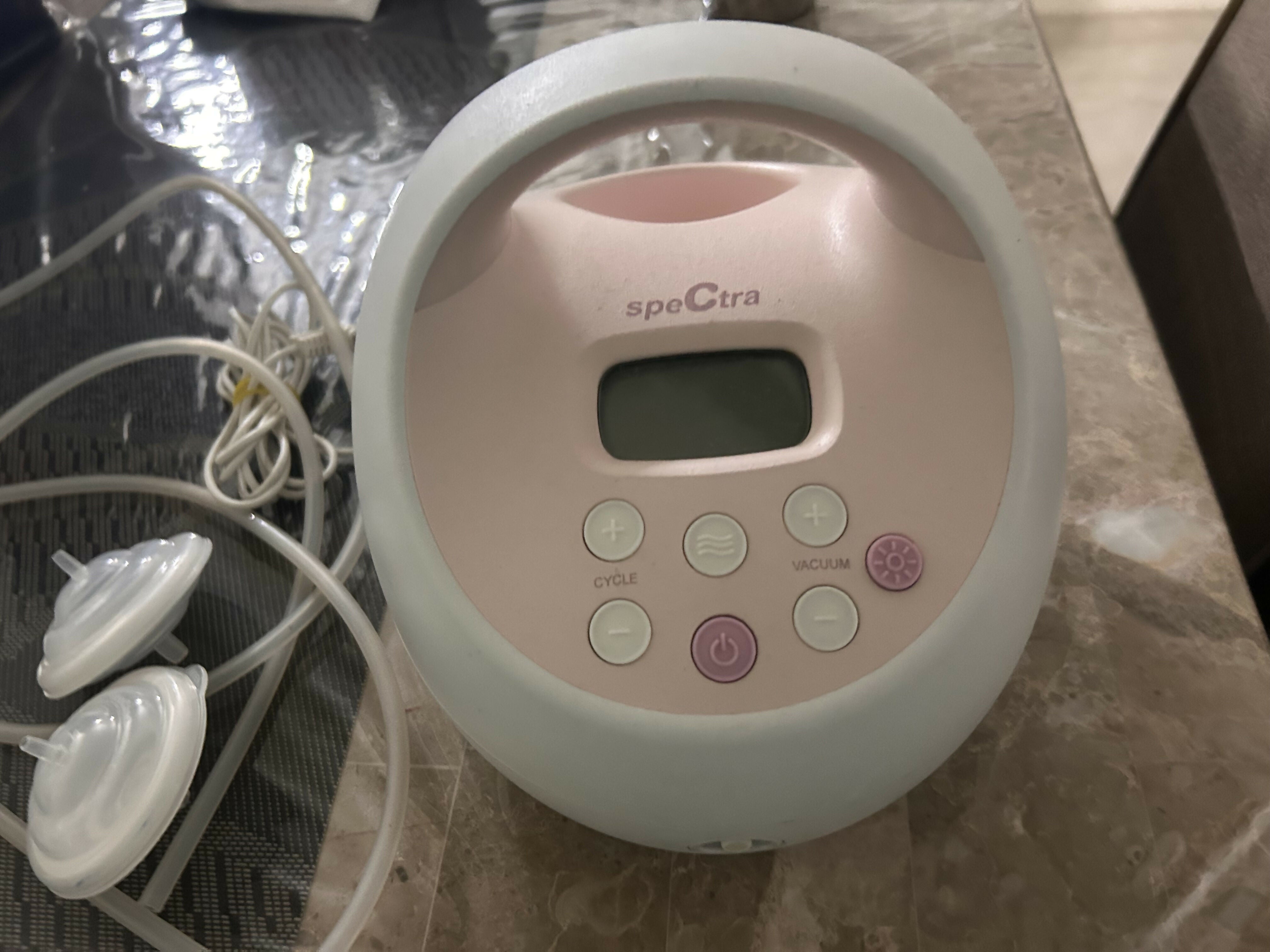 Spectra Electric Breast Pump with adjustable suction levels, massage mode, closed-system hygiene, quiet operation, BPA-free components, and ergonomic controls for comfortable and efficient milk expression.
