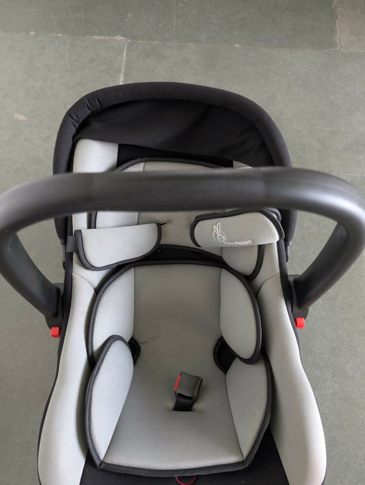 Baby car seat with gray and black design
