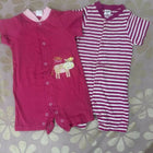 Set of 2 Rompers for baby girls, featuring soft, breathable fabric and easy snap closures for comfort and convenience.