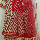 Elevate your baby girl's style with the captivating combination of red and skin color - a perfect blend of vibrancy and warmth for her adorable wardrobe