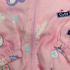 Pink children's jacket with cartoon characters and text 