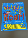 Children's book titled 'Wriggle and Roar!' with colorful text and illustrations