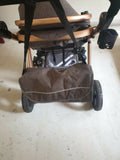 3-in-1 Z Fold Luxury Stroller—sleek grey design, explosion-proof wheels, and easy portability for comfort and style.