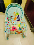  Infantso Rocker/Bouncer for Baby - Comfort, Safety, and Entertainment in One Portable Design.