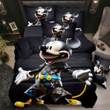 Mickey Mouse-themed bedding set on a bed with decorative pillows.