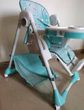 Children's high chair with blue and white design 