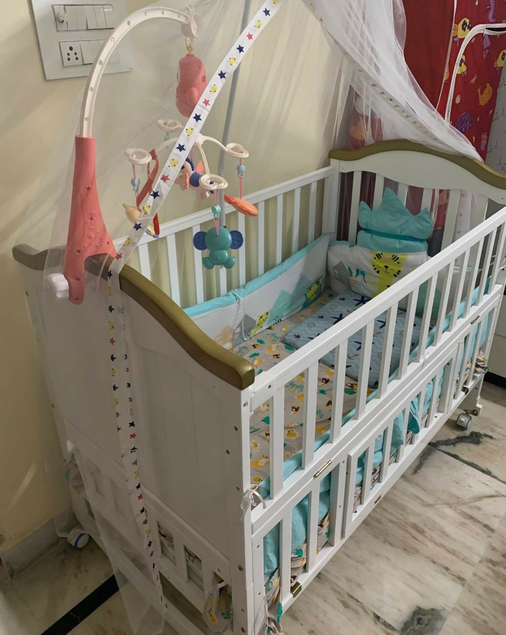 The StarAndDaisy Premium 12-in-1 Baby Bed Cot Crib is the perfect nursery essential, growing with your child while offering versatile features like cradle, bed, and desk functionality, with convenient storage!