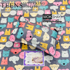 Children's bedding set with colorful animal patterns on a gray background, featuring Mokshay branding.