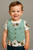 Child wearing a green vest 