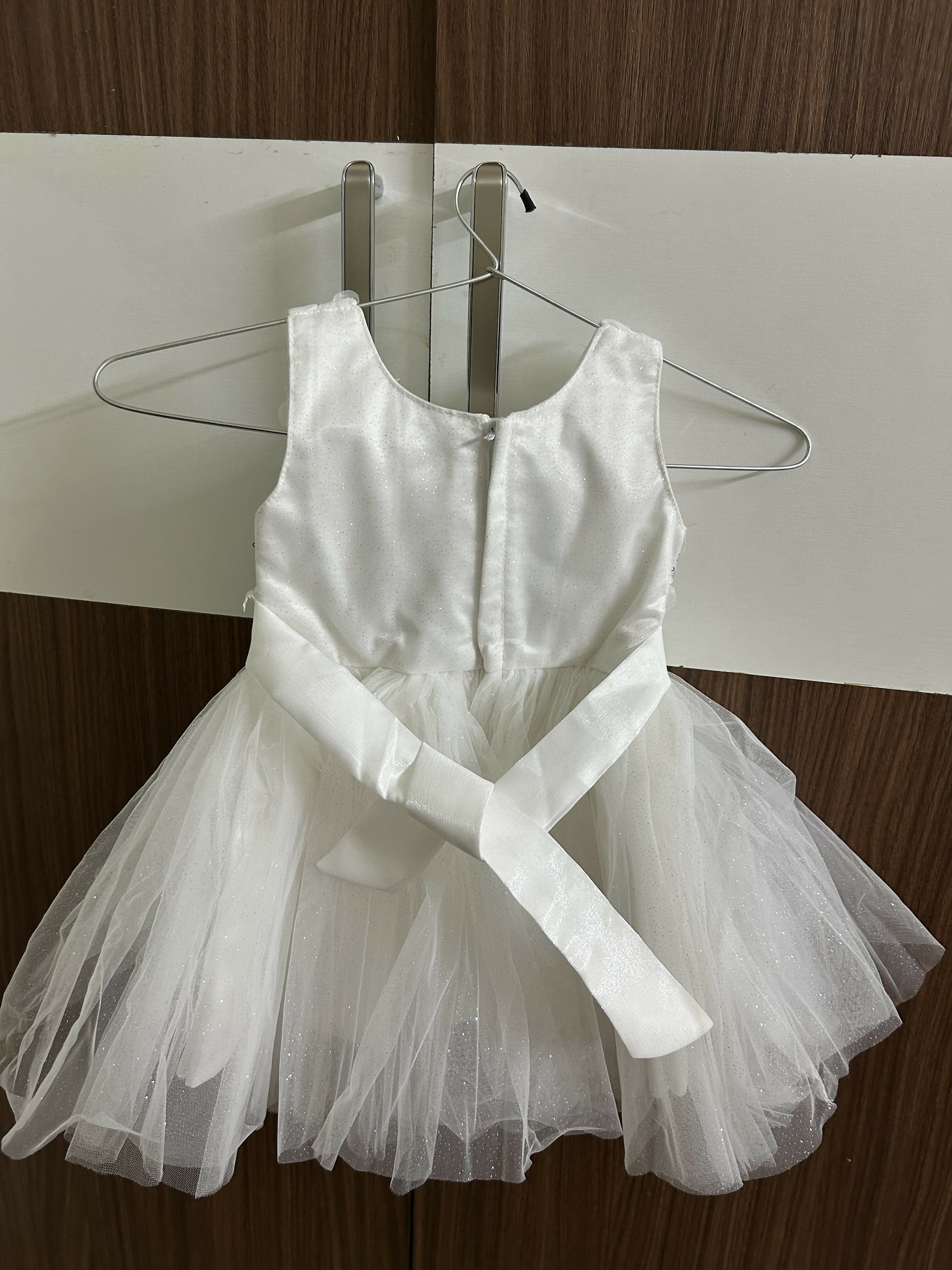 White dress with a sheer overlay 