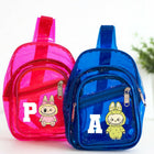 Pink and blue transparent mini backpacks with cartoon characters on a white background