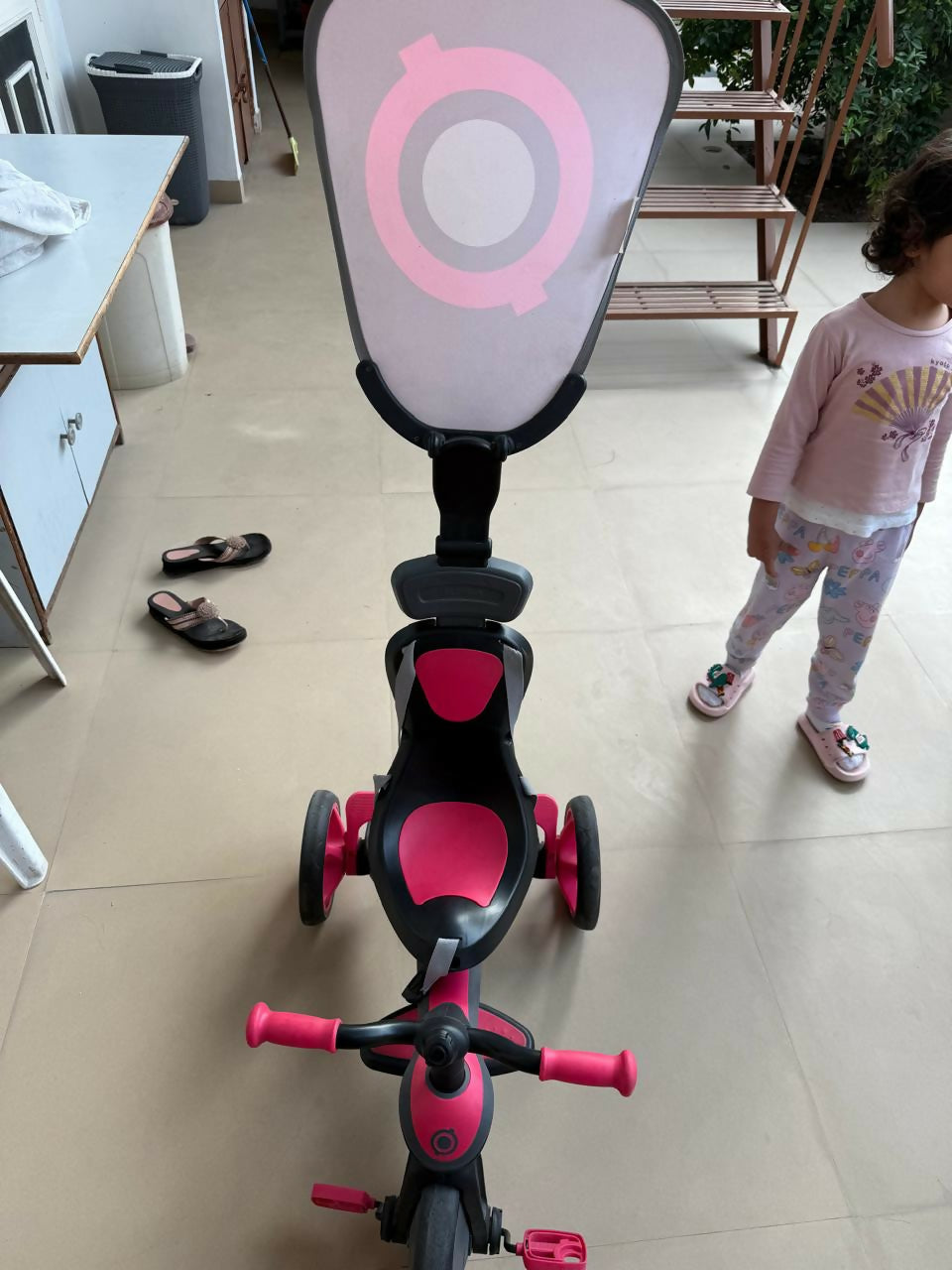 Baby tricycle with a sturdy frame, smooth wheels, ergonomic seat, and parent steering handle—perfect for safe and fun toddler adventures indoors and outdoors.