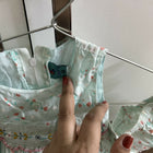 Baby dress with floral pattern 