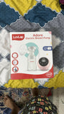 LuvLap Adore Electric Breast Pump packaging on a patterned surface