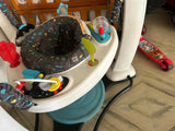 Evenflo Exersaucer jumper – fun, developmental activity center with bouncing seat, rotating toys, lights, and music for baby’s growth journey.

