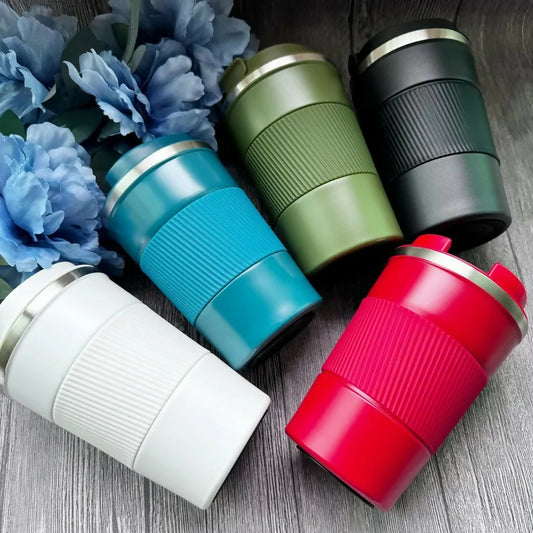 Set of colorful travel mugs