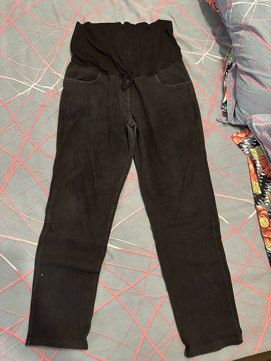 Black pants on a gray surface with red lines