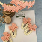 Our collection of headbands and tic-tac clips provides the perfect combination of style and function to complete any hairstyle.