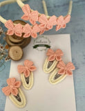 Our collection of headbands and tic-tac clips provides the perfect combination of style and function to complete any hairstyle. 