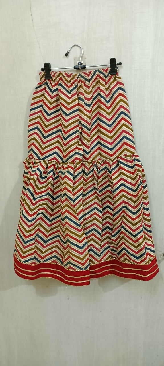 Elevate your baby girl's style with the captivating combination of red and skin color - a perfect blend of vibrancy and warmth for her adorable wardrobe